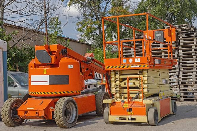 forklift maneuvering through a warehouse with stocked shelves in Gibsonburg, OH